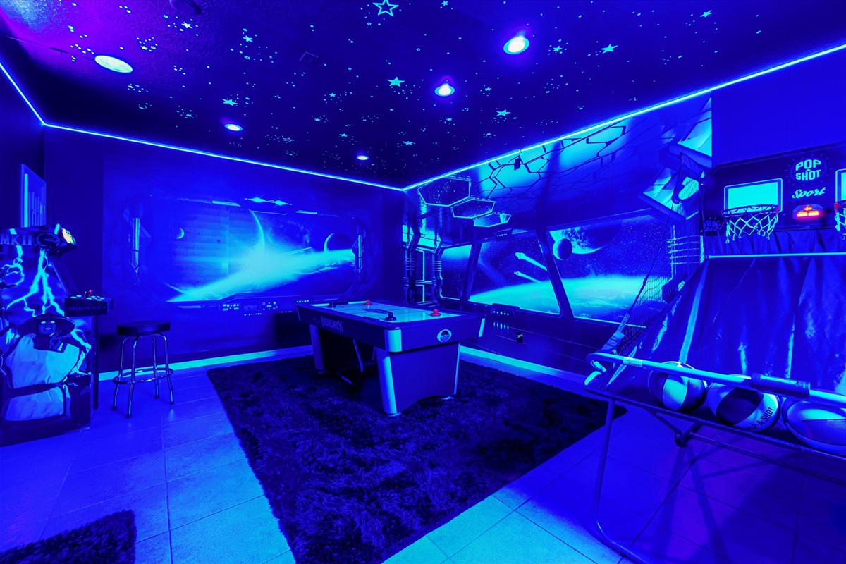 Step into The Jedi Lounge: a fully themed Star Wars arcade glowing under a galaxy of stars.