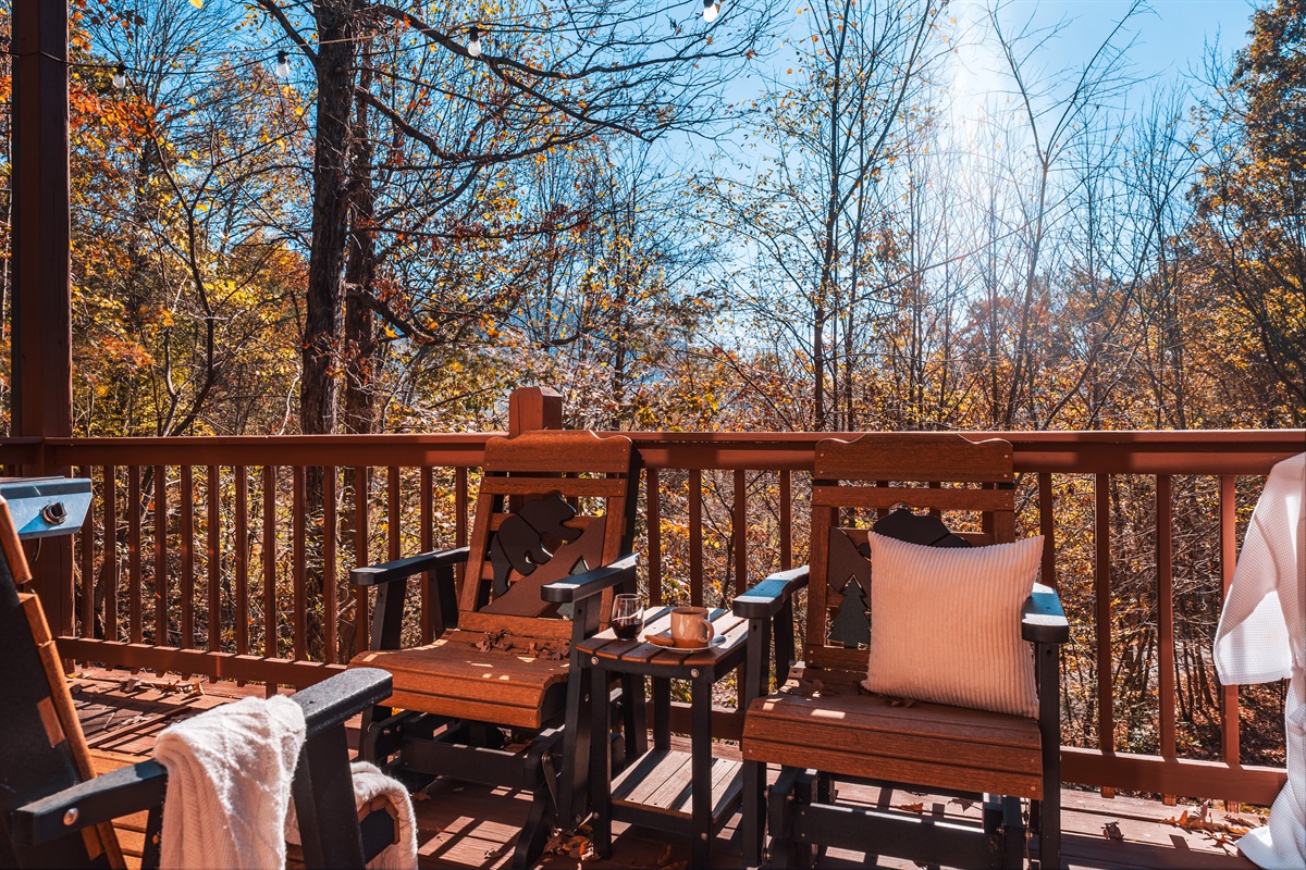 A balcony with chair having a stunning view of the mountains is the perfect location to relax.