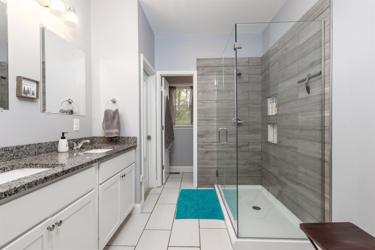 En suite bathroom with large walk in shower