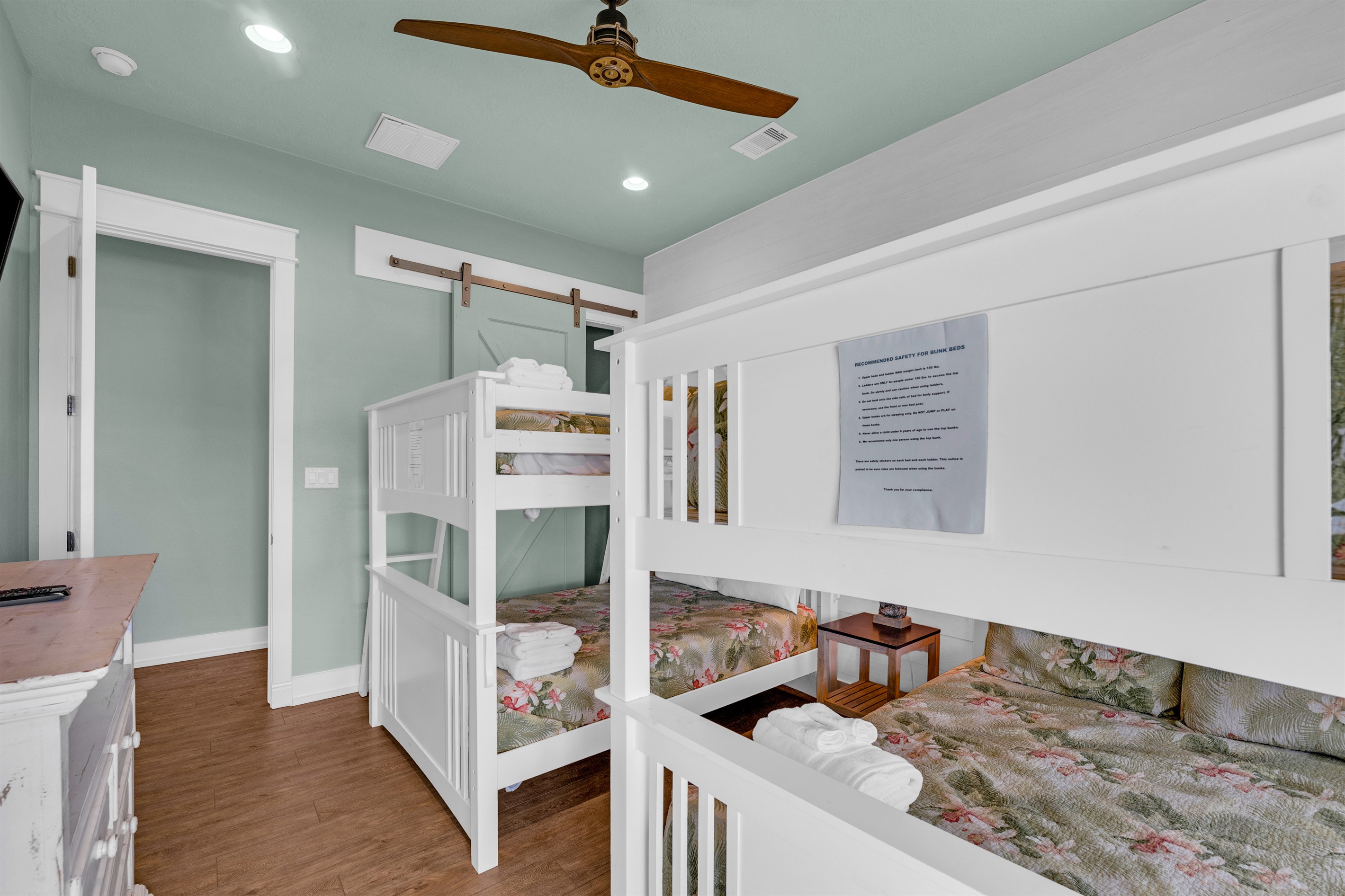Sea It All: Full bunk room, excellent for families, youth guests and sleeps 8. With full closet, storage chest available under the SMART TV w/ personal access to the upper deck.
