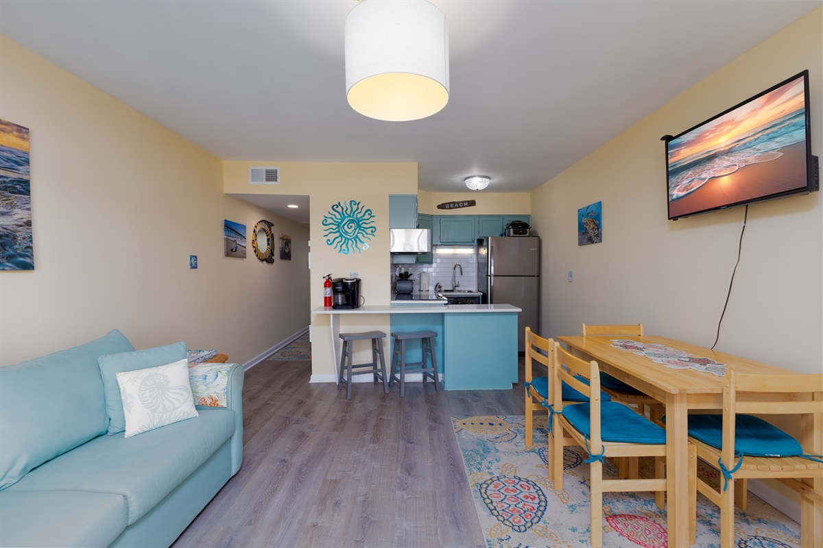 View into living area and kitchen from the balcony