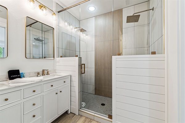 Second Floor-Bathroom 2 (connected to bedroom 2-Master)  Amenities include:  travel-size shampoo & conditioner, small bar of hand soap, individual-wrapped cotton swabs-4 count, 2 makeup removal microfiber towels, mat for hot tools, and a hair dryer.  
