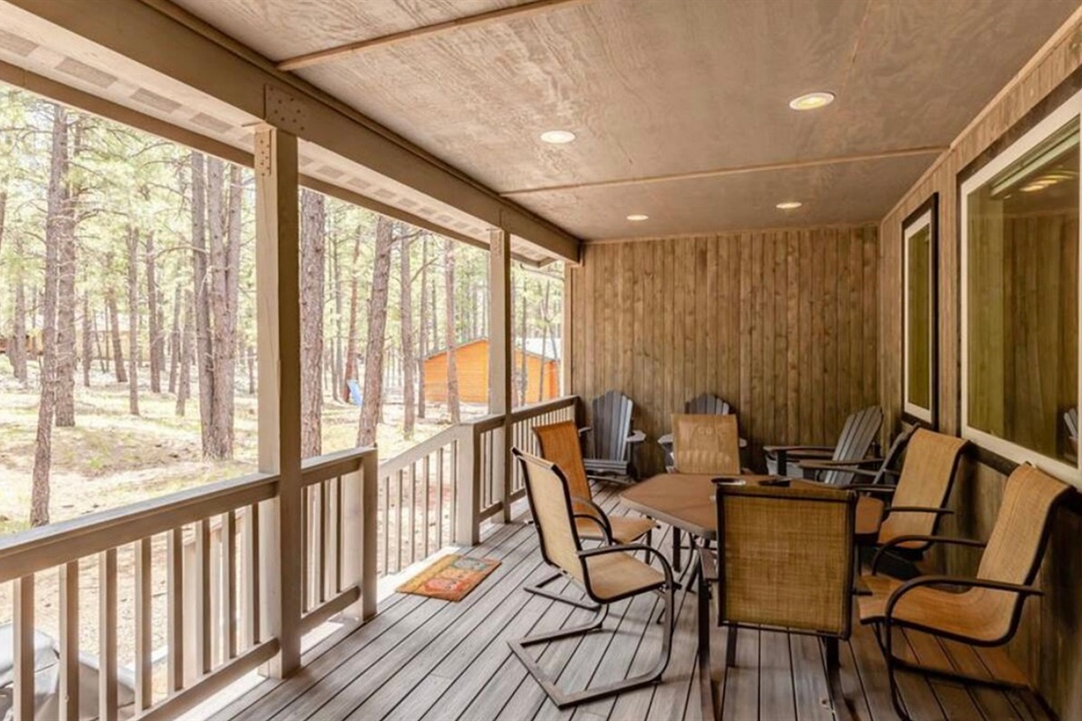 Covered porch seating for relaxing mornings and evening gatherings.