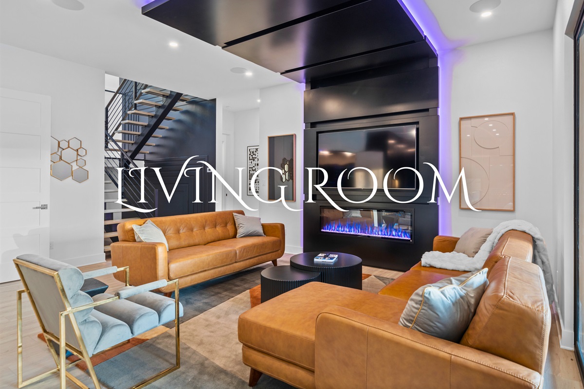 Cozy up by the fire and enjoy some quality family time. This living room is all about comfort and style.