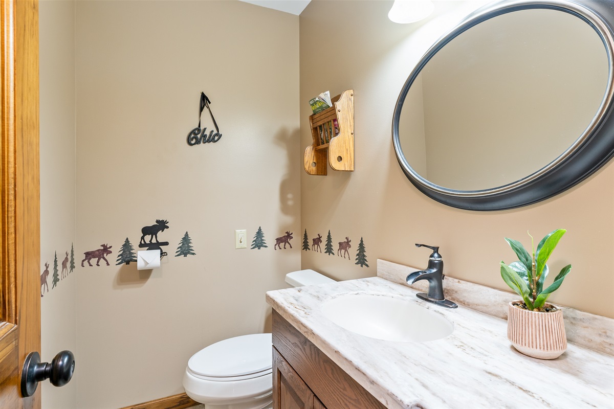 Bright full half bathroom on the main floor 