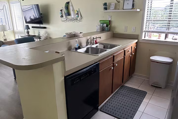 Fully stocked kitchen with stainless steel appliances