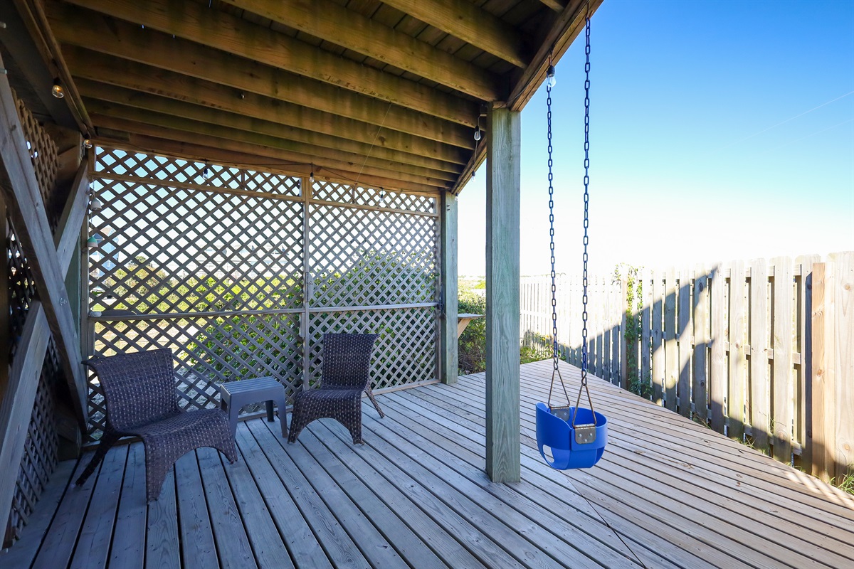 Casual seating in the carport area
