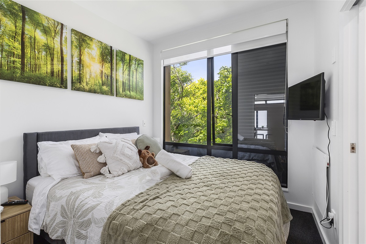 Cute Bedroom looking through the Trees