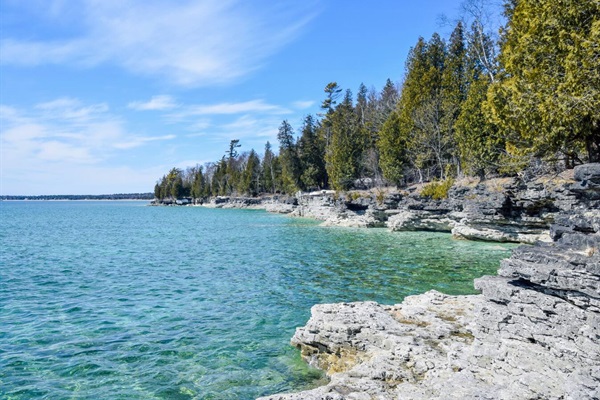 The shoreline between our home and Cave Point Park. Centuries old limestone!
