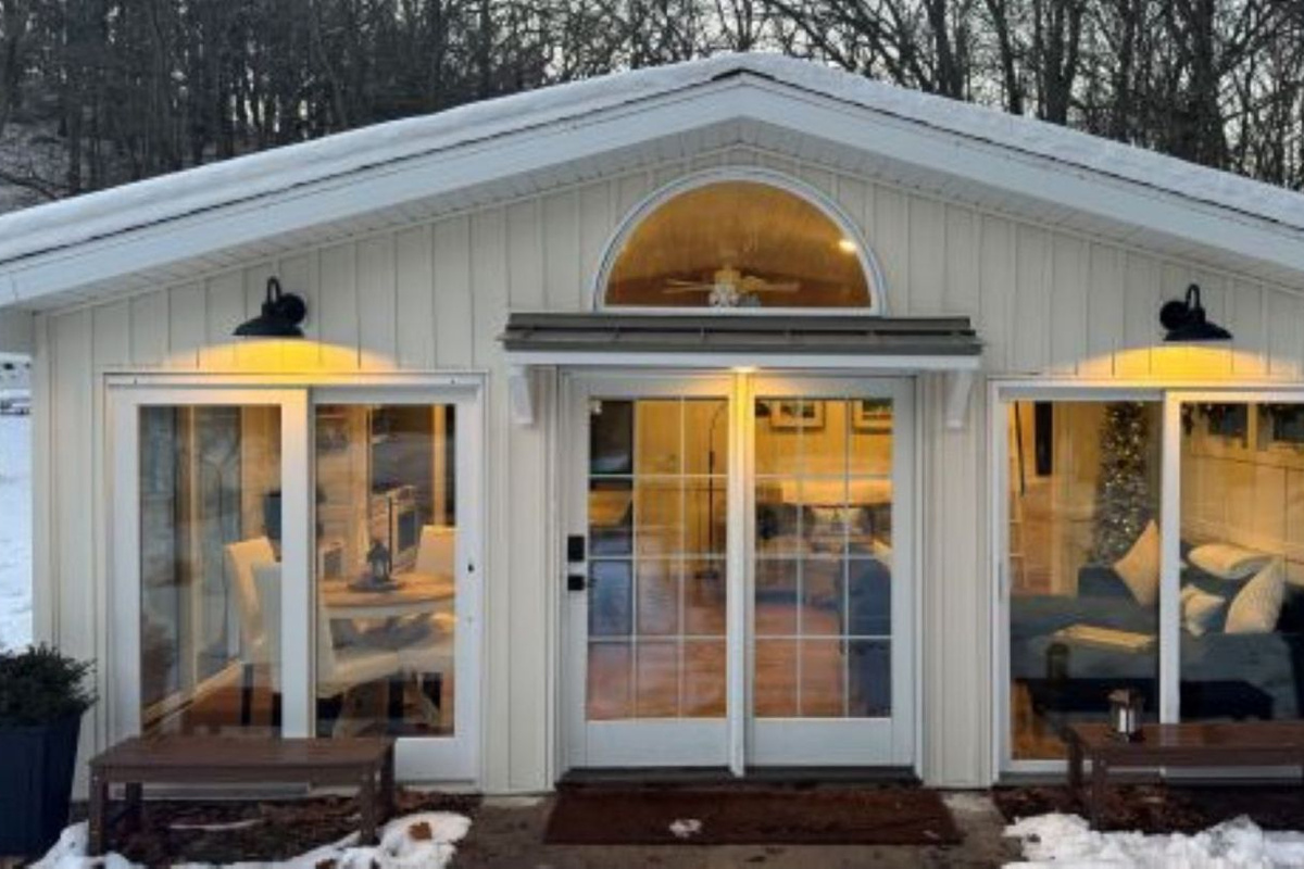 The floor to ceiling glass doors! All windows have adjustable cellular shades