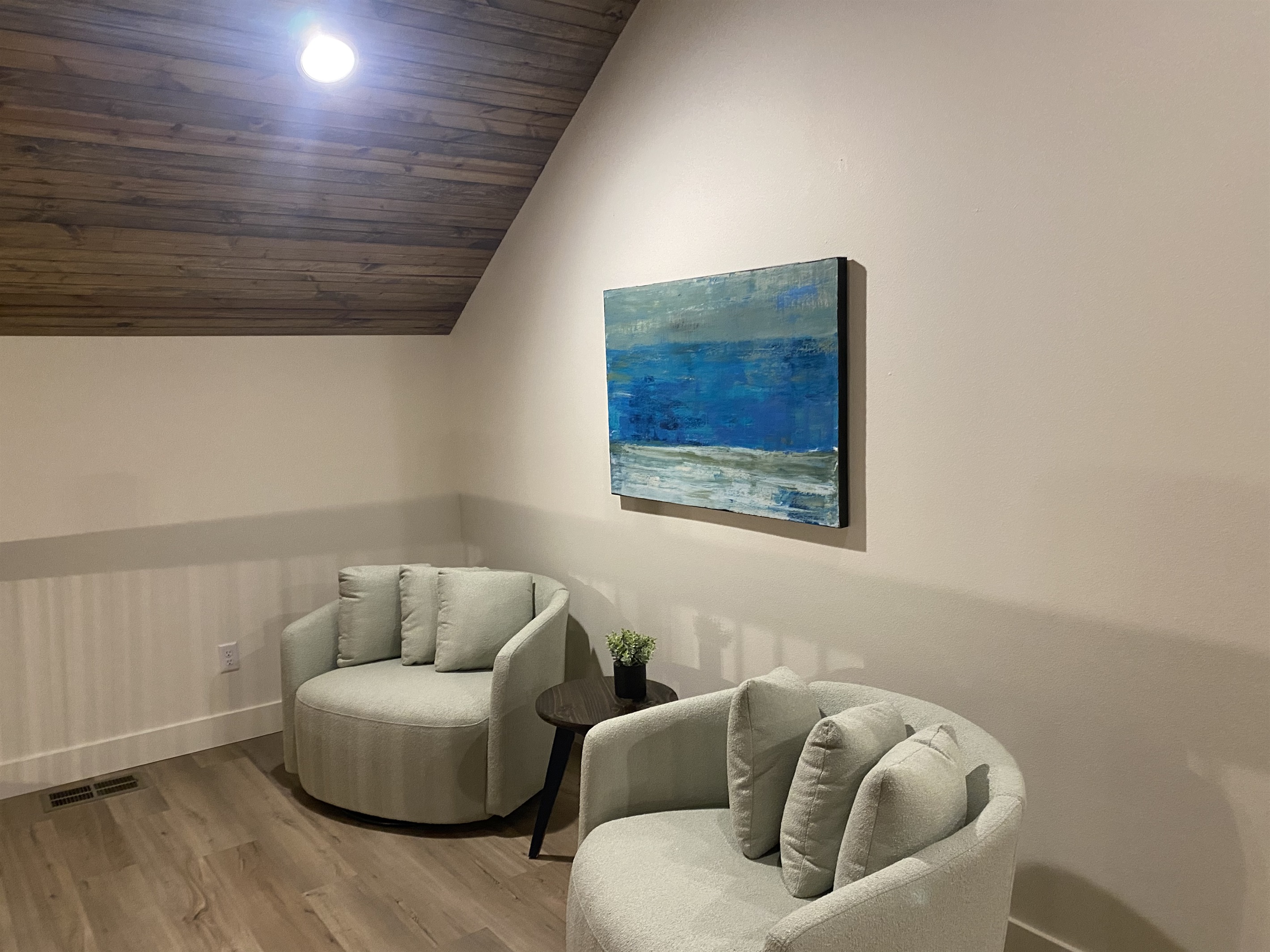 Spend some time relaxing in the loft in these oversized swivel chairs 