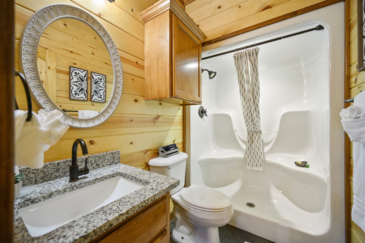 2nd full bath sits between bunk room and 2nd king bedroom.