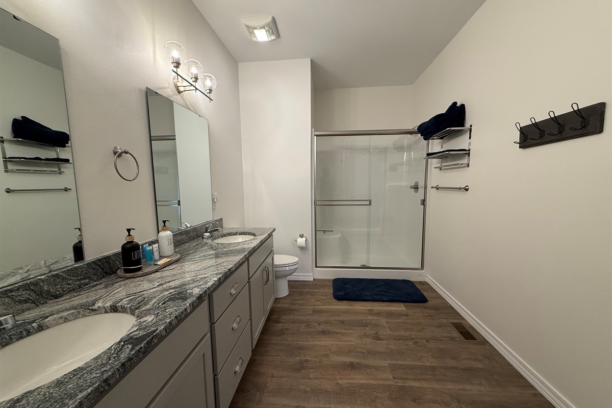 Master bedroom en-suite. Shower with glass doors and seat. Double bowls and granite countertop 