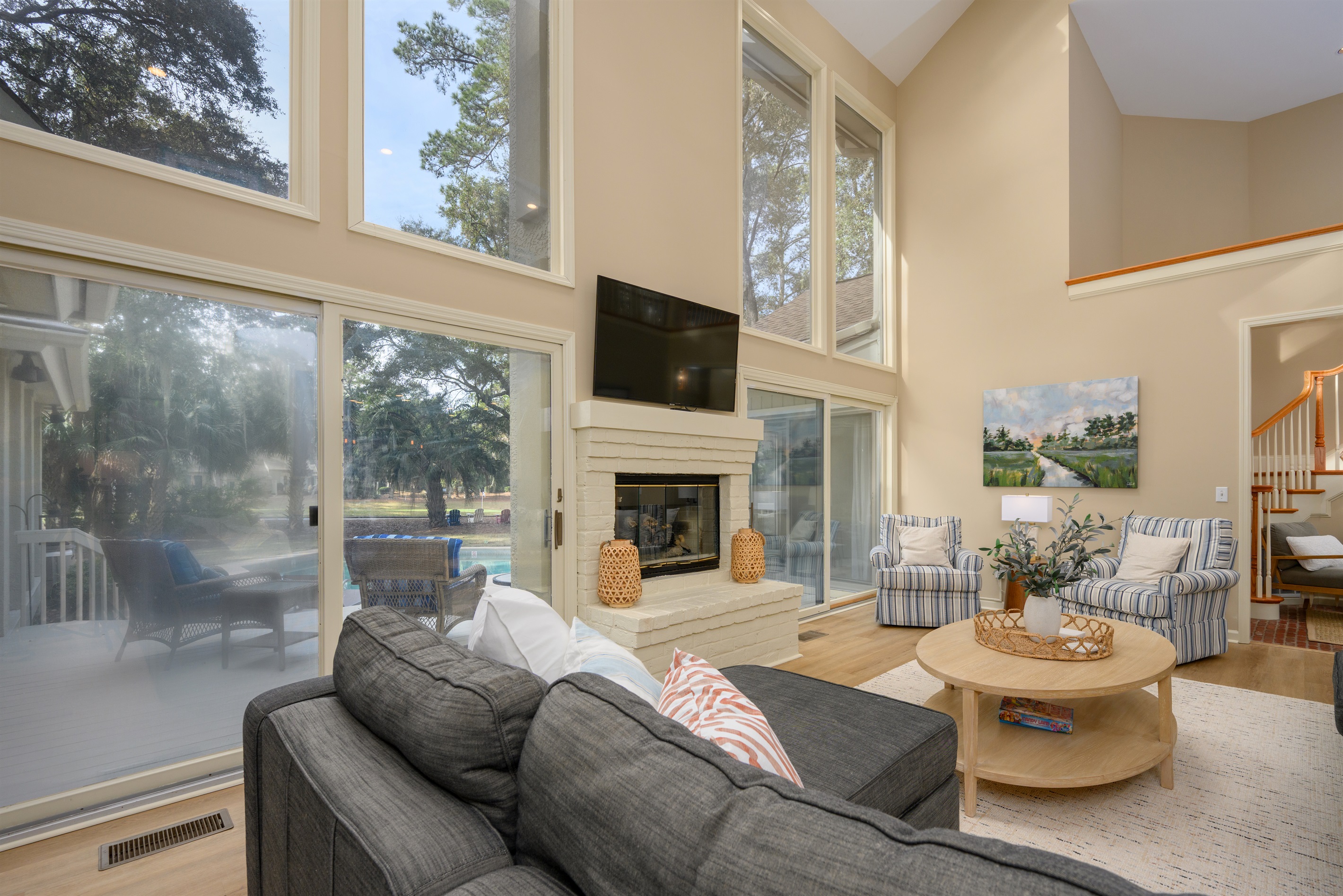 Large comfortable living room with 65" HDTV