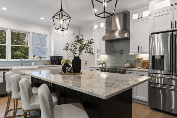 Large fully stocked chefs kitchen.