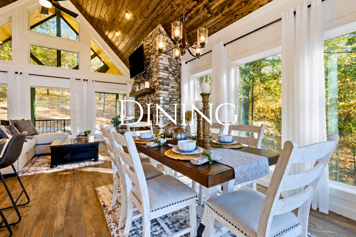 Gather around the dining table surrounded by beautiful forest views and natural light streaming in from every angle.