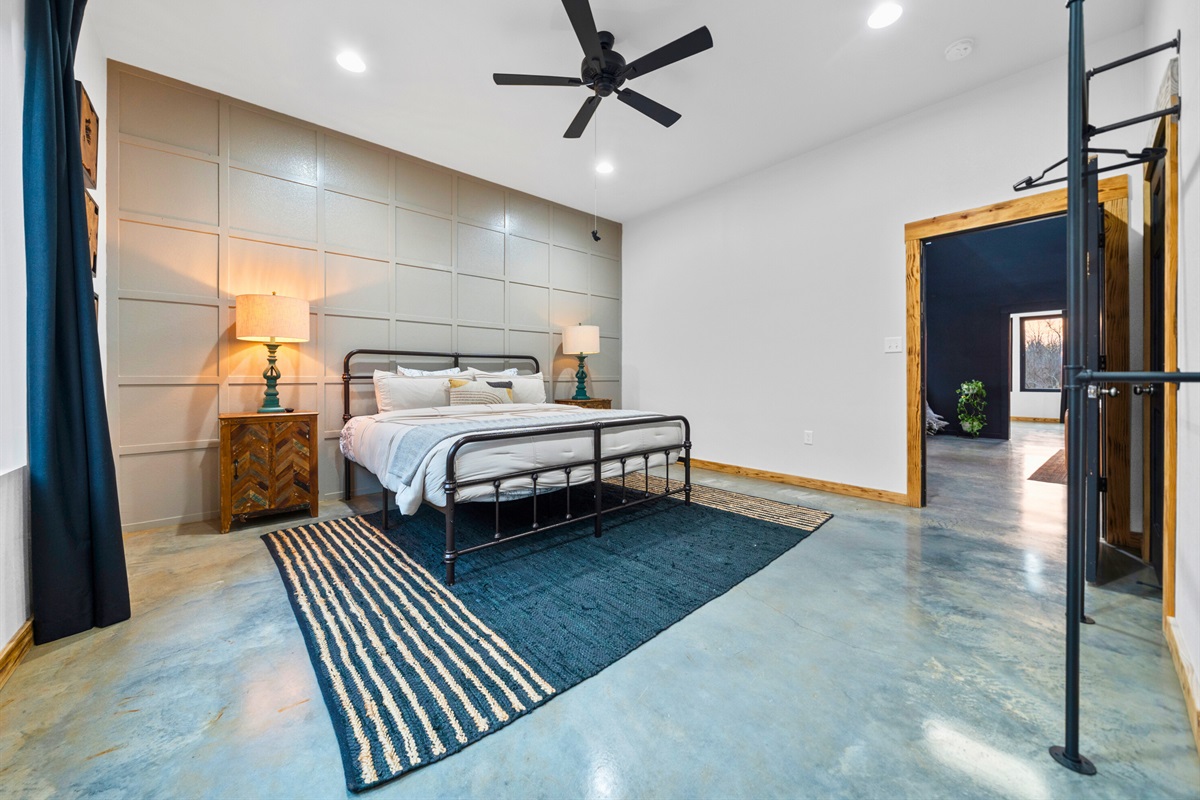 The thoughtful layout and soft tones in this room create a calming retreat for guests.
