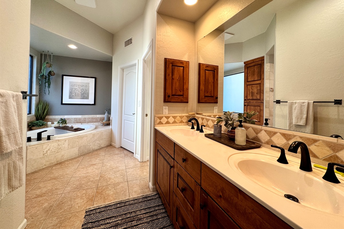 Large double vanity with plenty of counter top and storage to make getting ready a breeze. Hair dryer and curling iron provided so leave that room in your suitcase for more important items!