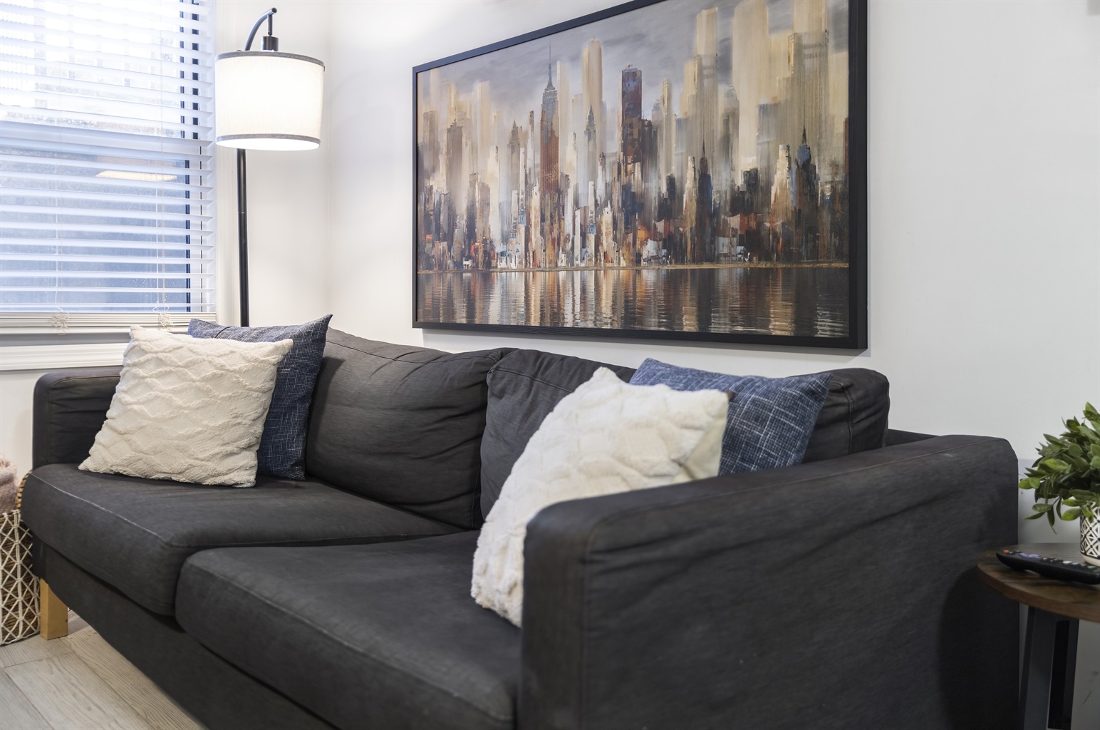 Stretch out on the sofa, kick your feet up, and let this cozy living room feel like your Brooklyn home base.