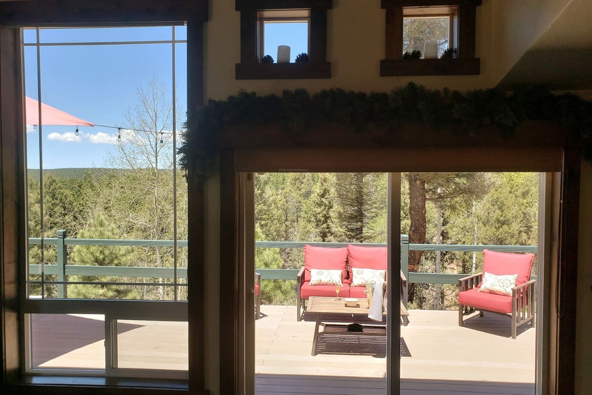 Arcadia doors lead to the wrap around deck for eating, socializing and hot tubbing!