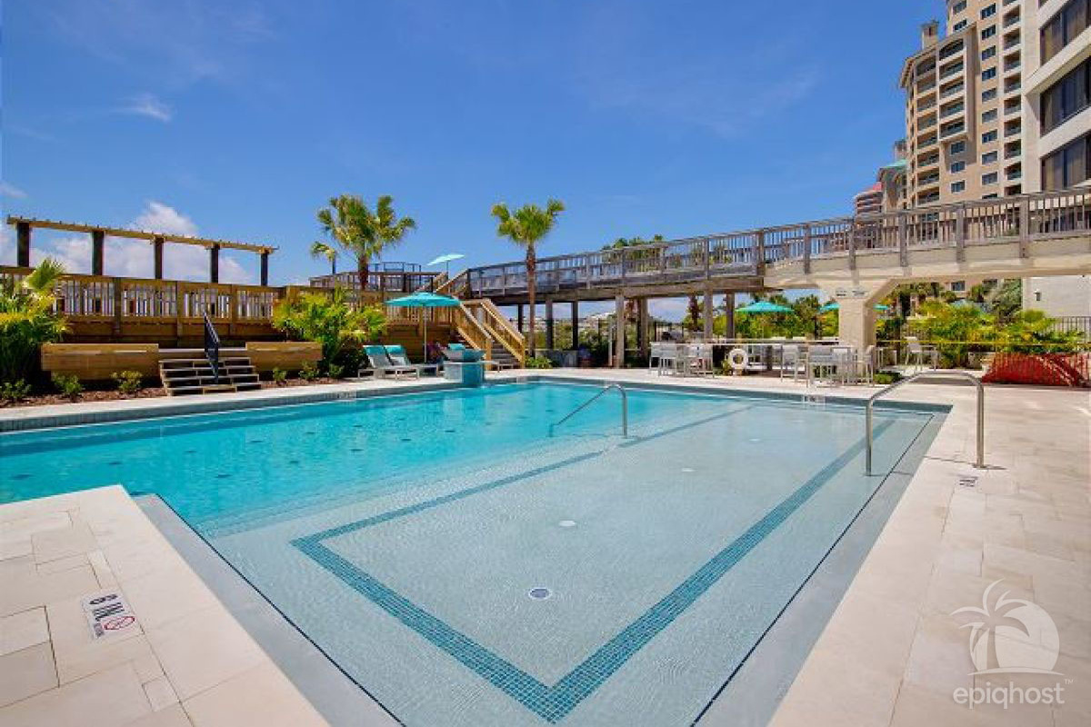 Pool and hot tub with covered lounge area