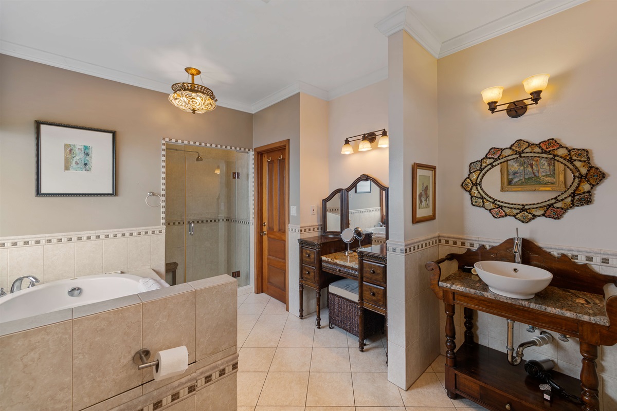 There is a separate vanity station so you dont have to crowd the sink with your products. *Please note this is not a jetted tub 