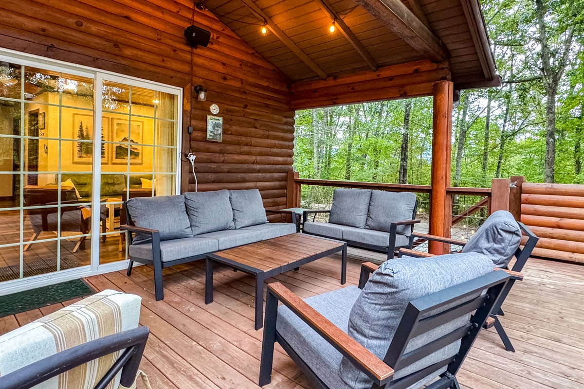 Our covered deck features plenty of comfy seating - perfect for coffee in the morning listening to the birds as the mountain fog burns away.