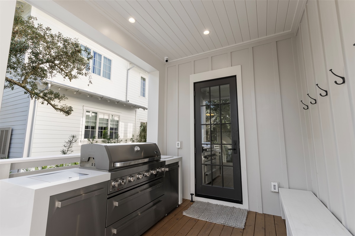 Outdoor Kitchen + Entry to Laundry Room/Mud Room