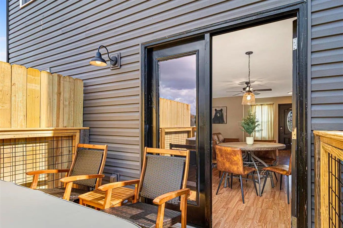 Step outside to the deck for a breath of fresh air and a view of the neighborhood, a perfect spot to unwind.