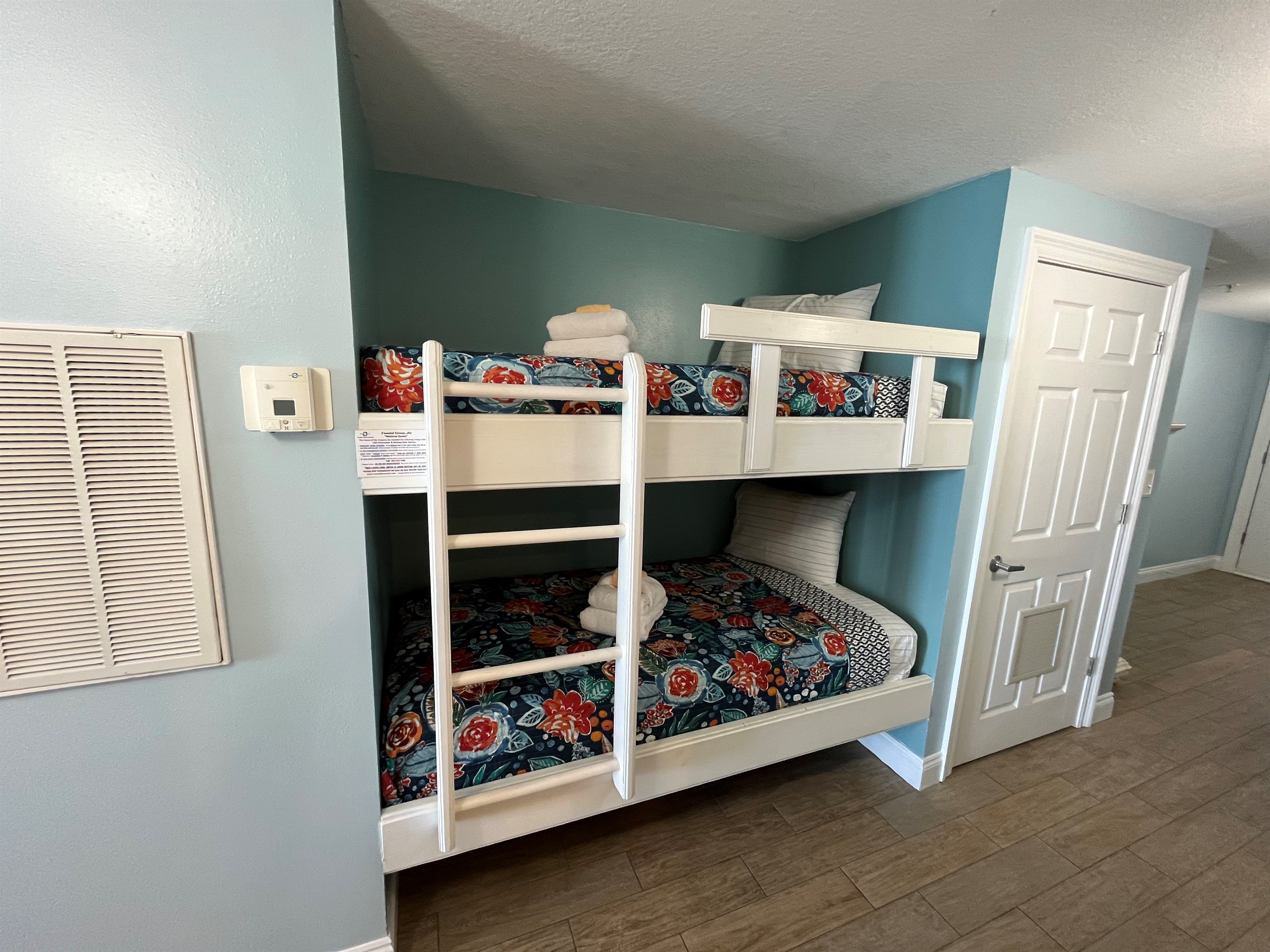 Twin-over-twin bunk alcove, a fun and cozy sleeping space the kids will love!