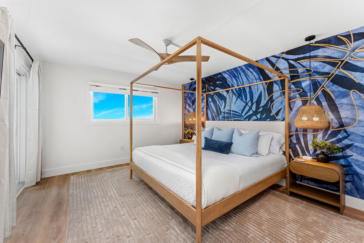 The Master bedroom is where you'll wake up to the sound of waves right from the comfortable king bed. Step out onto the private balcony to watch the sunrise over the water.
