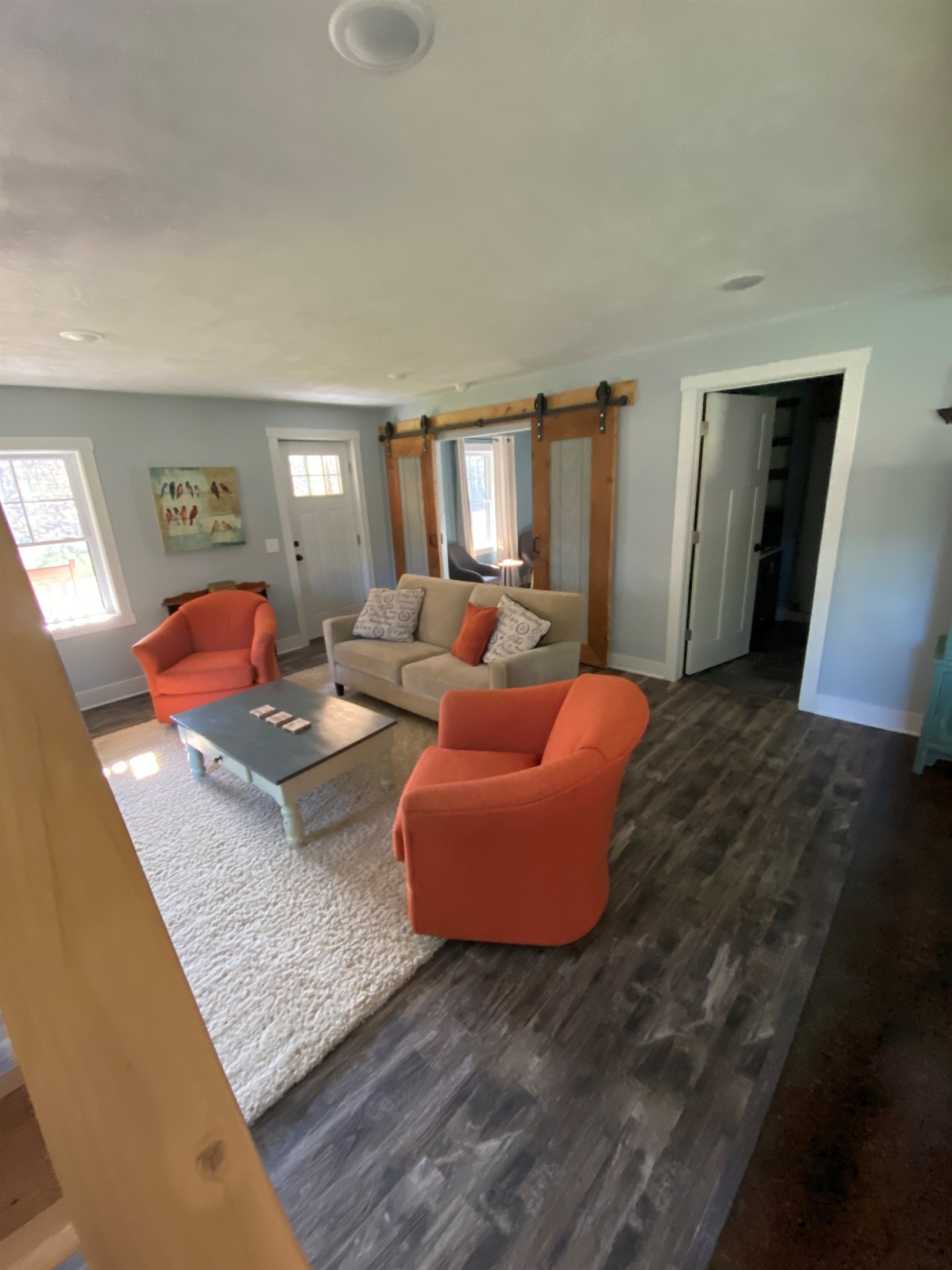 Living Room Barn Doors go to Main Floor Bedroom