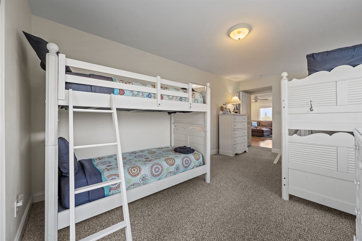 Comfortable bunk bedroom with plenty of space and easy access to nearby living areas