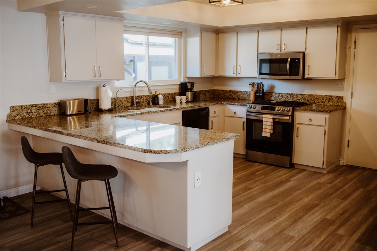 Bright, fully equipped kitchen with modern finishes.