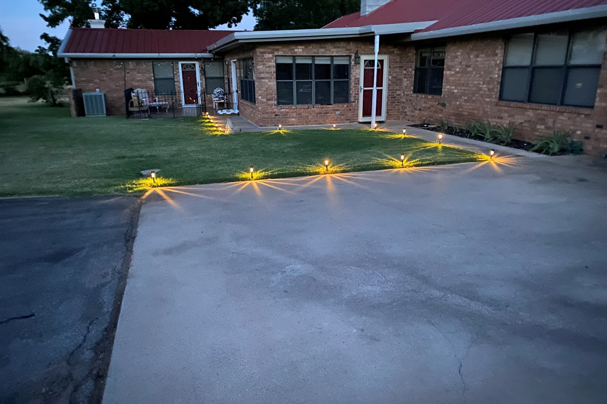Follow the solar lights all the way to the apartment entry