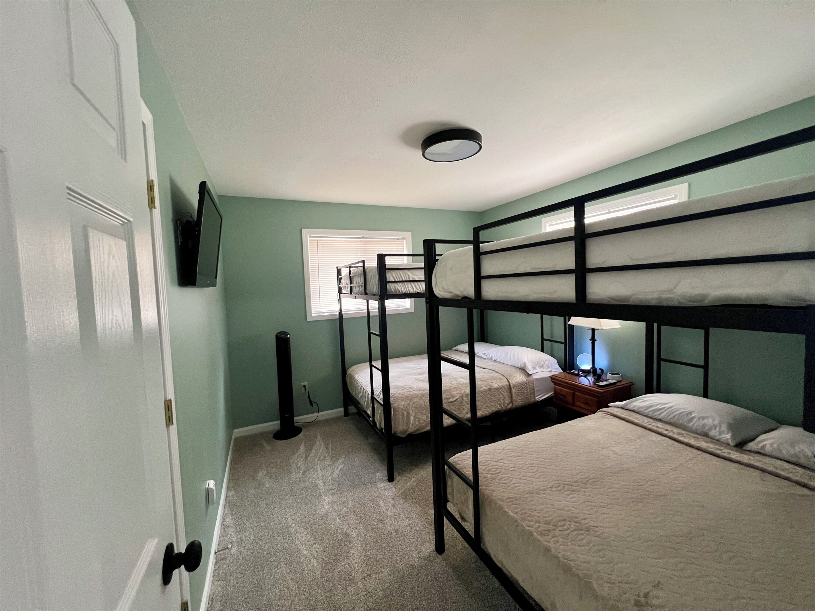 Bunk room with 4 full beds