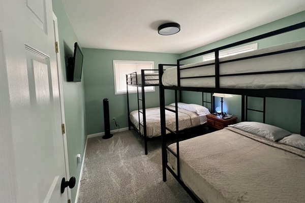 Bunk room with 4 full beds