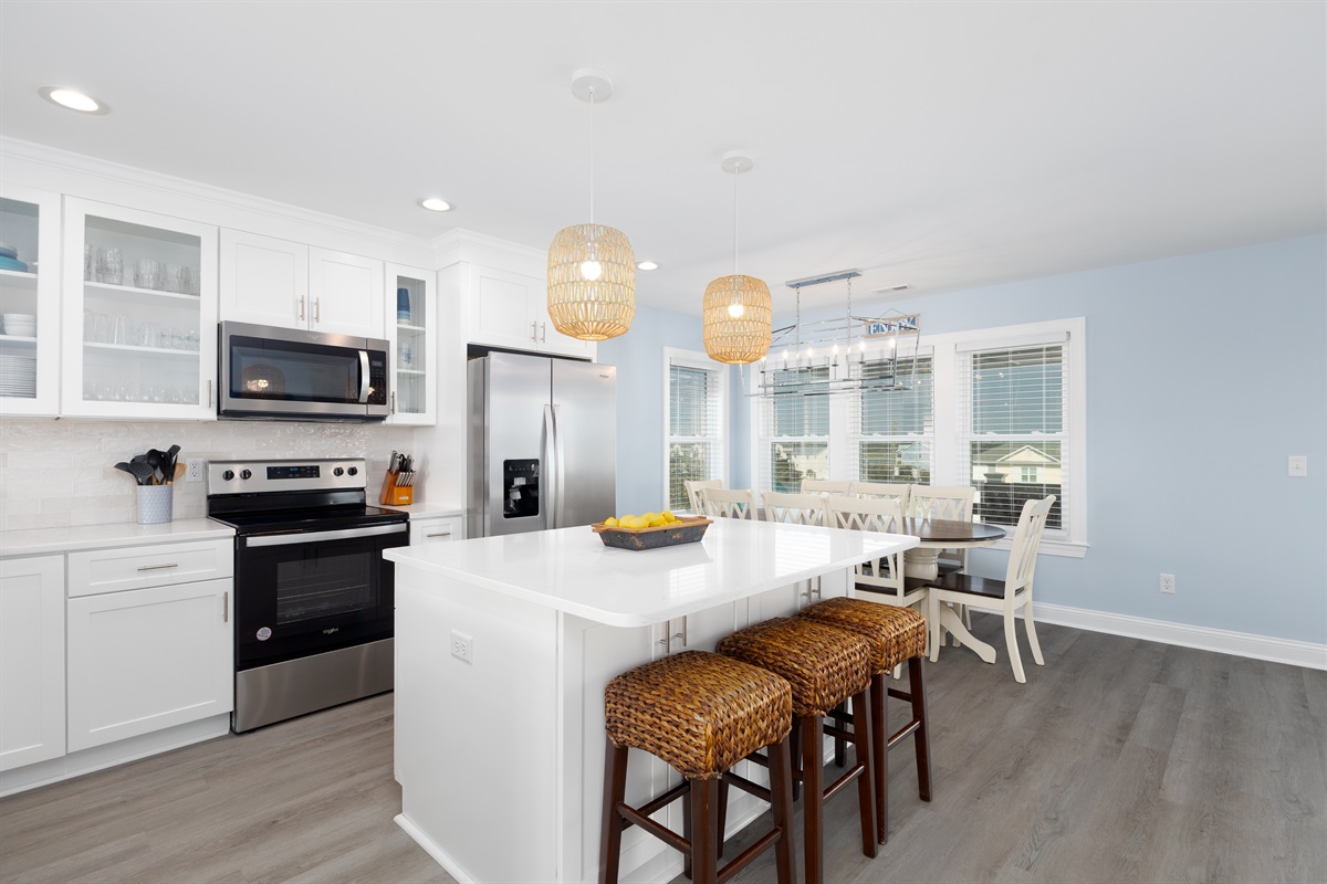 tainless steel appliances gleam in this contemporary kitchen