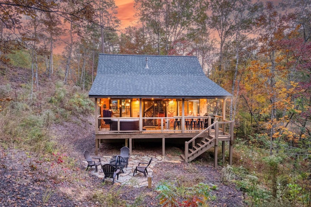 Behold the exterior of our beautiful cabin, a picture-perfect blend of rustic charm and modern comfort. Surrounded by nature's embrace, it stands as a timeless sanctuary, inviting you to escape, unwind, and make memories amidst its serene surrounding