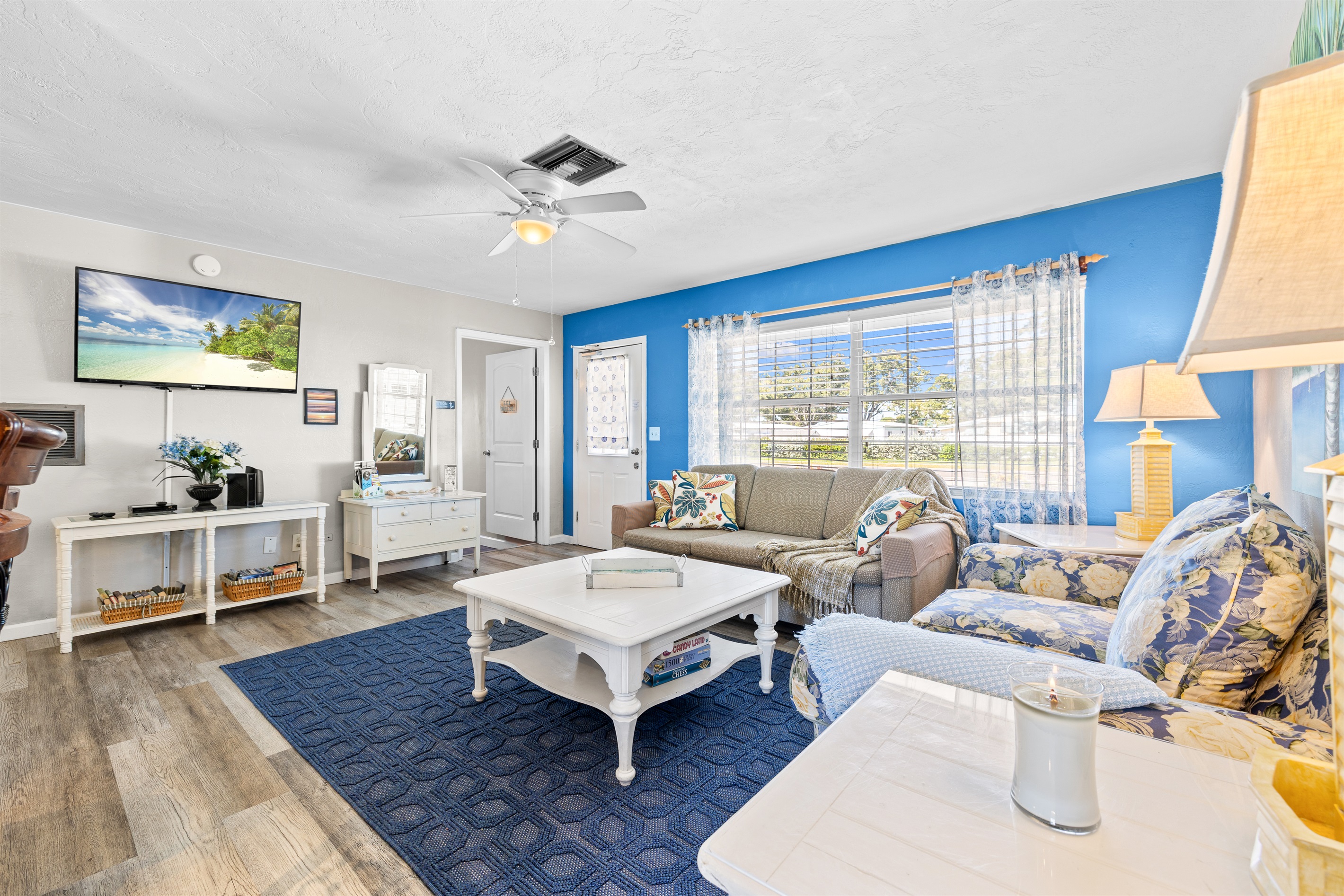 Living room w/Roku TV, Games, DVD player w/DVDs, Books & Local Info!  Sofa Bed is a Queen size MEMORY FOAM that is so comfortable! 