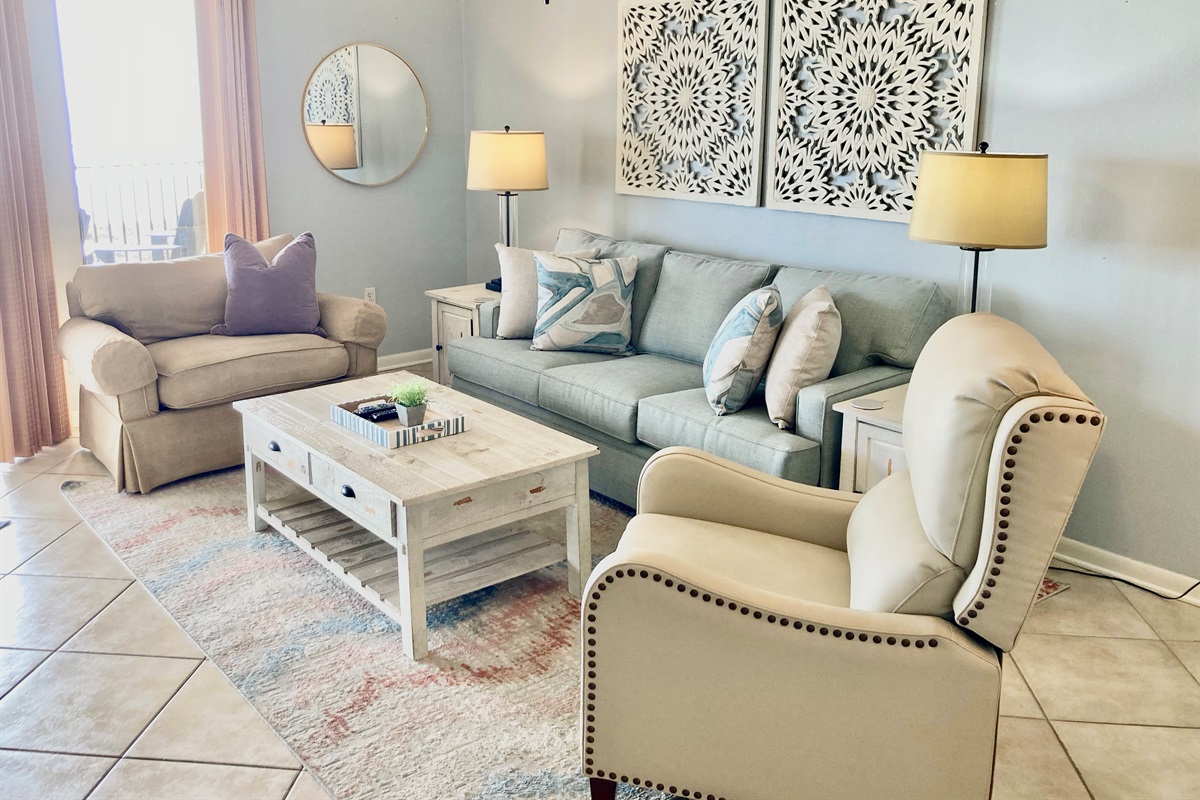 New queen sofa sleeper, oversized club chair and a leather recliner in the living room!