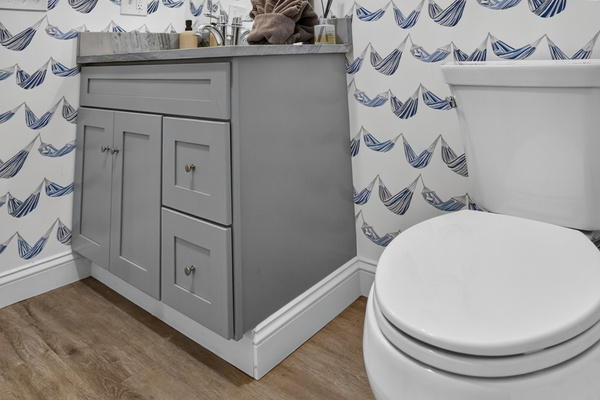 Modern full bathroom with a spacious walk-in shower and double vanity.
