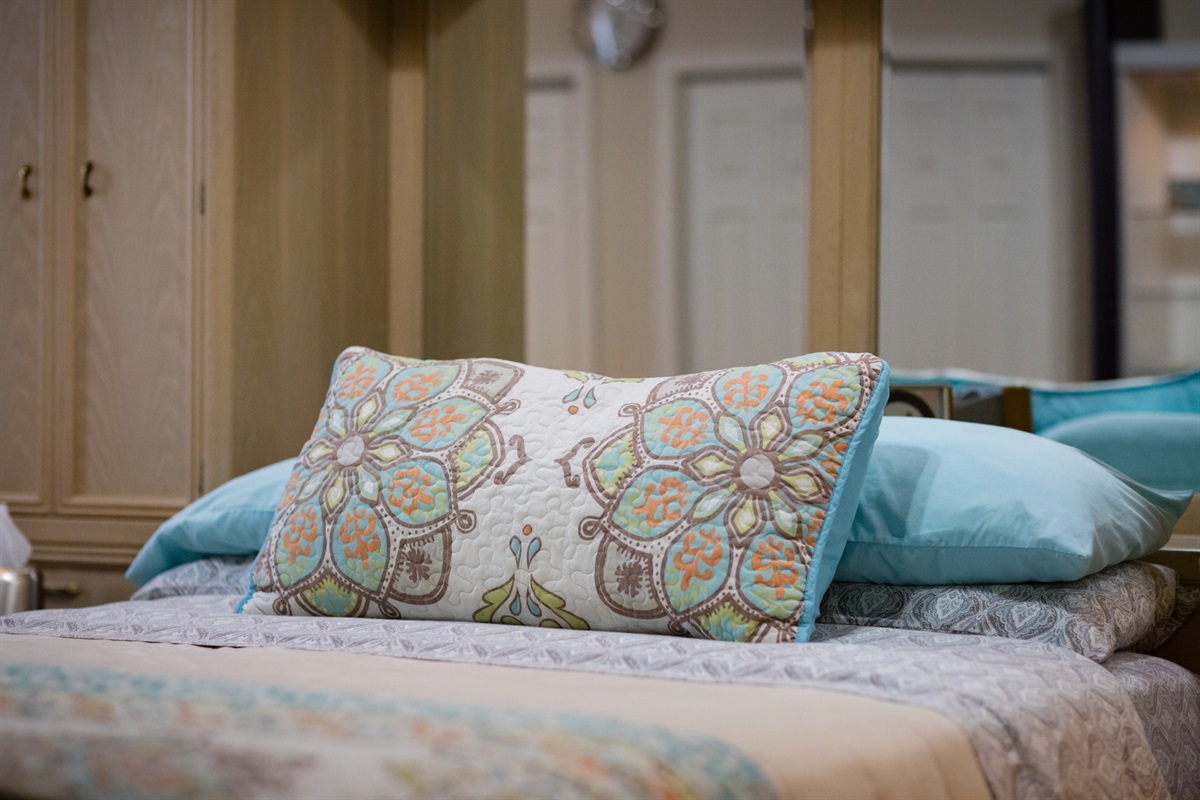 This Queen bed is very comfortable and we get lots of great comments from our guests! We have a variety of pillows on the bed. 