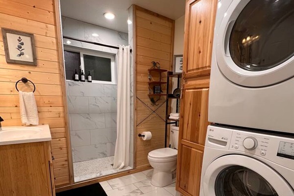 This bathroom, also on the 2nd floor includes a laundry area.   In fact,  there are laundry areas in each of the separate sleeping areas for your convenience.   Laundry soap, and dryer sheets are provided.   