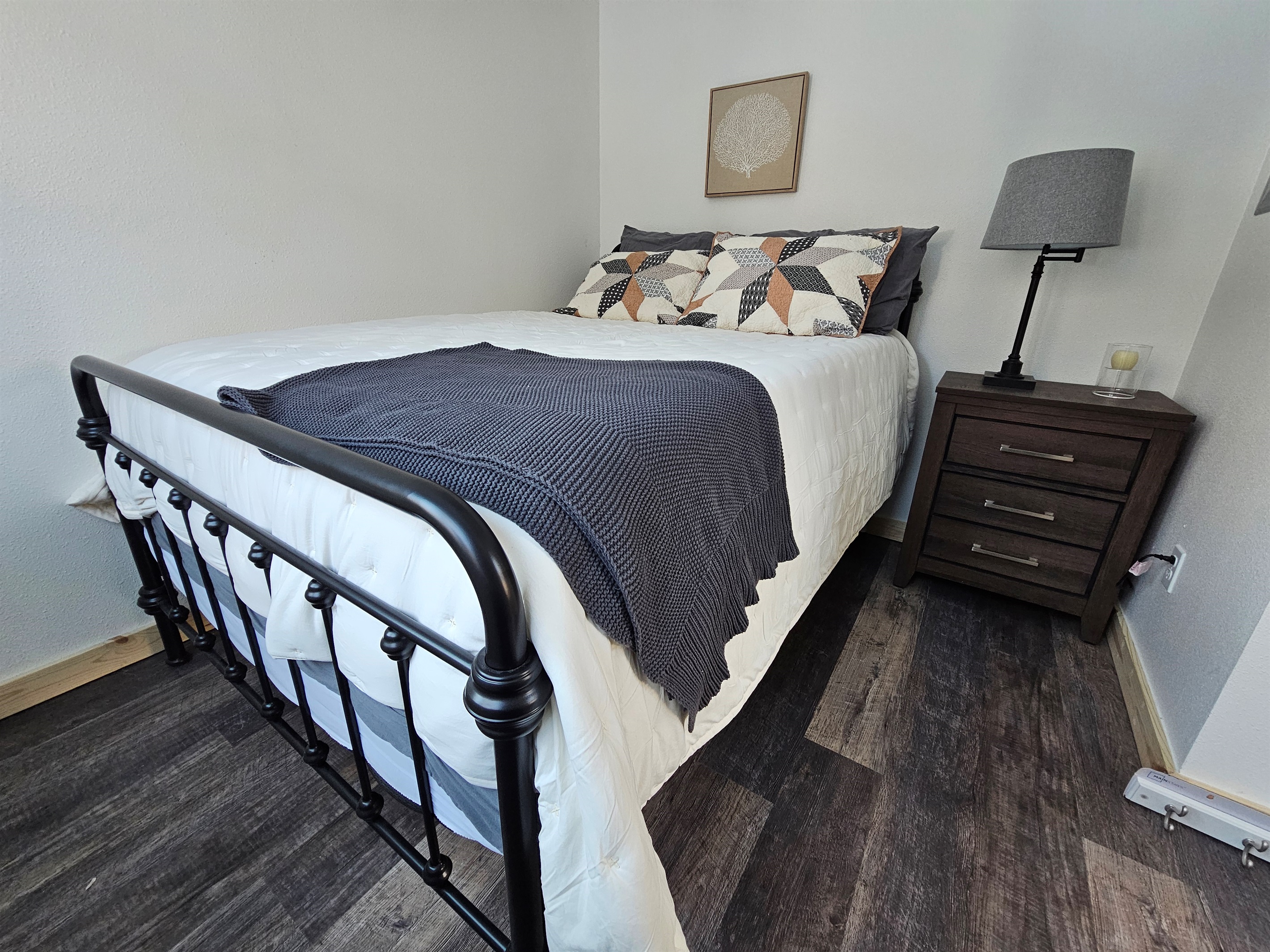 Bedroom on main floor includes a Queen Size Bed (cabin is still being furnished so furniture may vary by cabin).