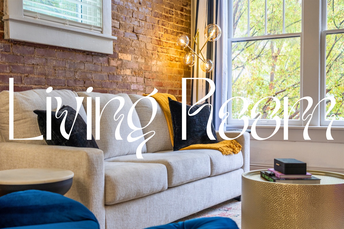 The living room blends colorful furniture, cozy lighting, and thoughtful decor for a comfortable place to relax.