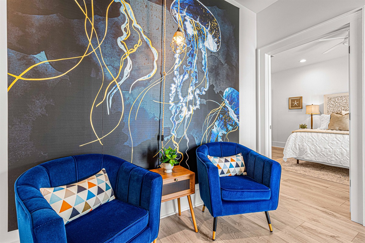 Upstairs, the landing offers another get-away spot, to read a book, or access the upstairs veranda for the egg chair.The landing provides access to three more bedrooms, all with private bathrooms, and the washer/dryer.