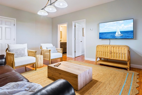 Here’s our basement living room—ideal for movie nights, chatting with loved ones, or just kicking back and enjoying the space!