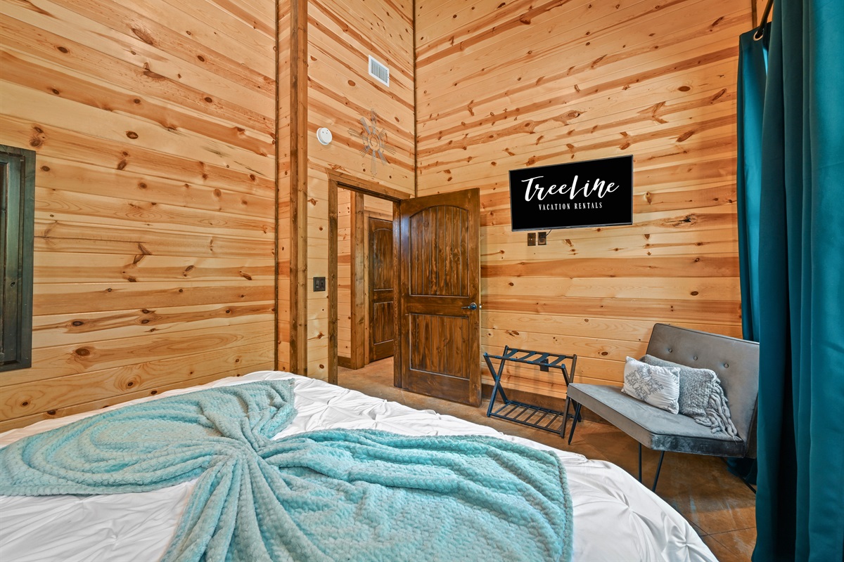 A peaceful setting and soft hues make Bedroom 3 a lovely hideaway for reading, resting, and recharging.