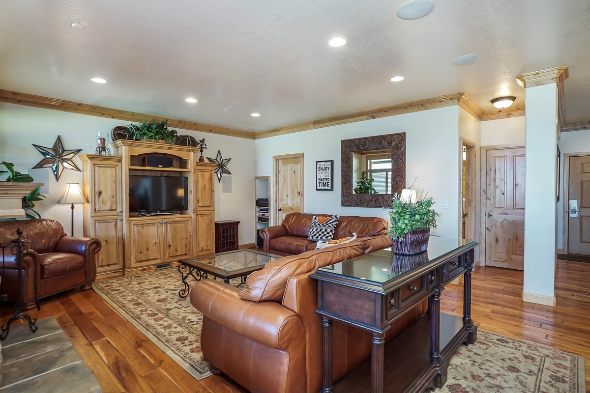 Open-concept living room with warm wood tones and plenty of space to unwind.